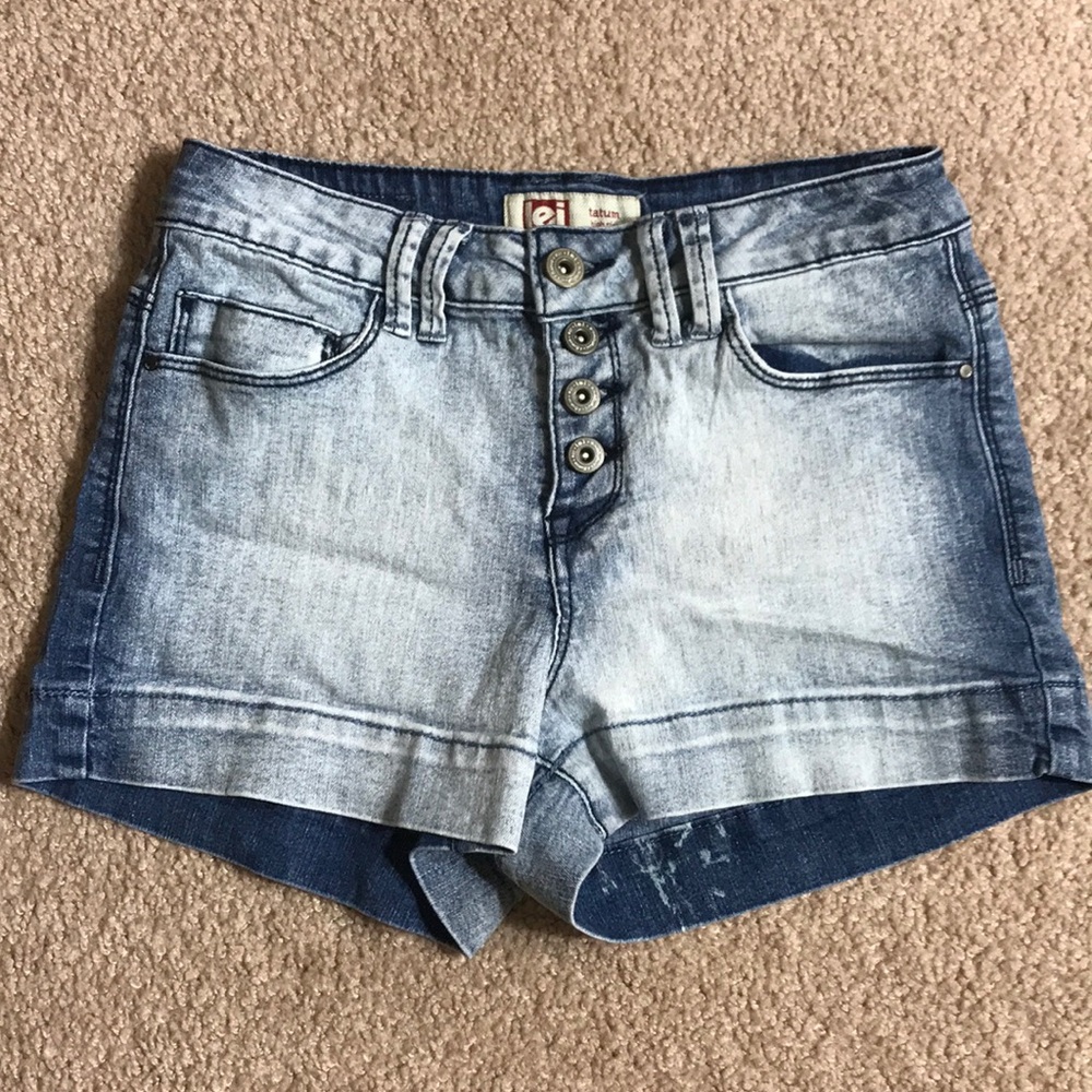 Denim high-waisted, button up shorts.
